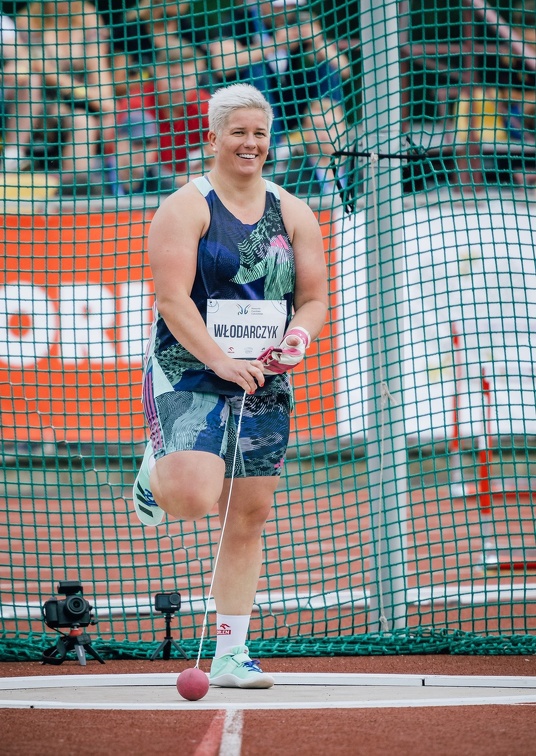 Smiling Anita Włodarczyk in the hammer throw circle